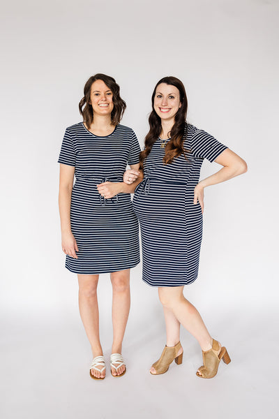 Navy and white striped maternity dress with cinched waist and nursing/breastfeeding panel